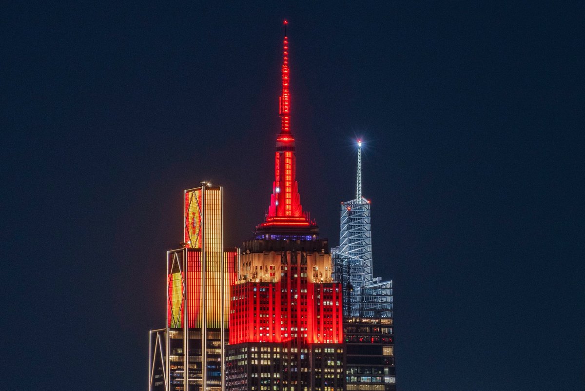 GaryHershorn's tweet photo. The Empire State Building and the JPMorgan Chase headquarters illuminate in the colors of the flag of Spain to mark its victory over Argentina in the FIFA World Cup 2026 final in New York City, Sunday evening #newyorkcity #nyc #newyork @SEFutbol @rfef @FIFAcom #Fifaworldcup2026 https://t.co/De5XPEQusF