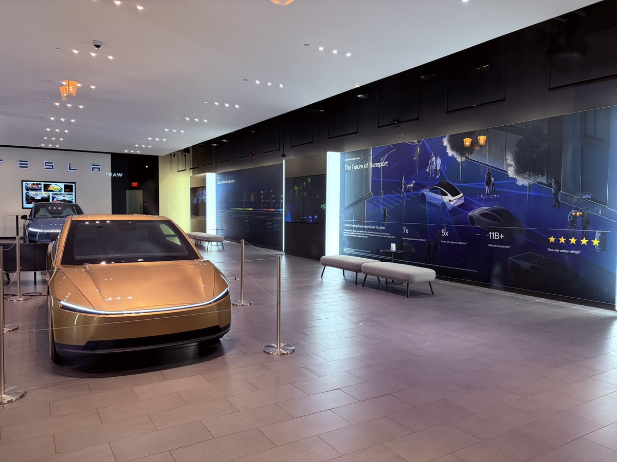 Starscream_SJC's tweet photo. Tesla Santana Row will be reopening tomorrow with a full focus on self-driving. Everything in the showroom is about Robotaxi and Cybercab with stats and information about the technology. The Cybercab on display is the production model. https://t.co/yIUYdOGFOp