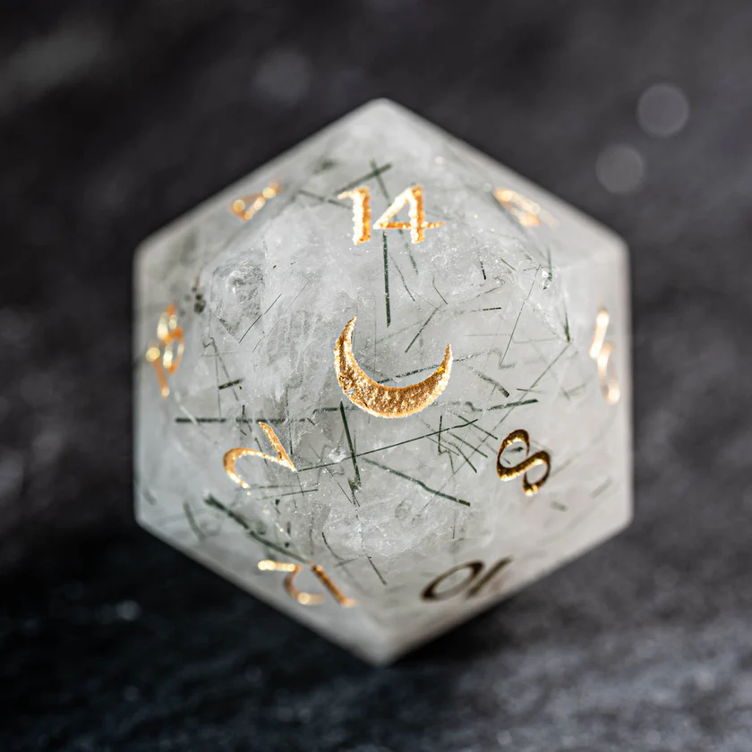 urwizards's tweet photo. Stone texture. Golden numbers.Quiet forest magic. Green Rutilated Quartz dice.

#dnddice #ttrpgdice #gemstonedice #dicegoblin https://t.co/e1dzVaRjvv