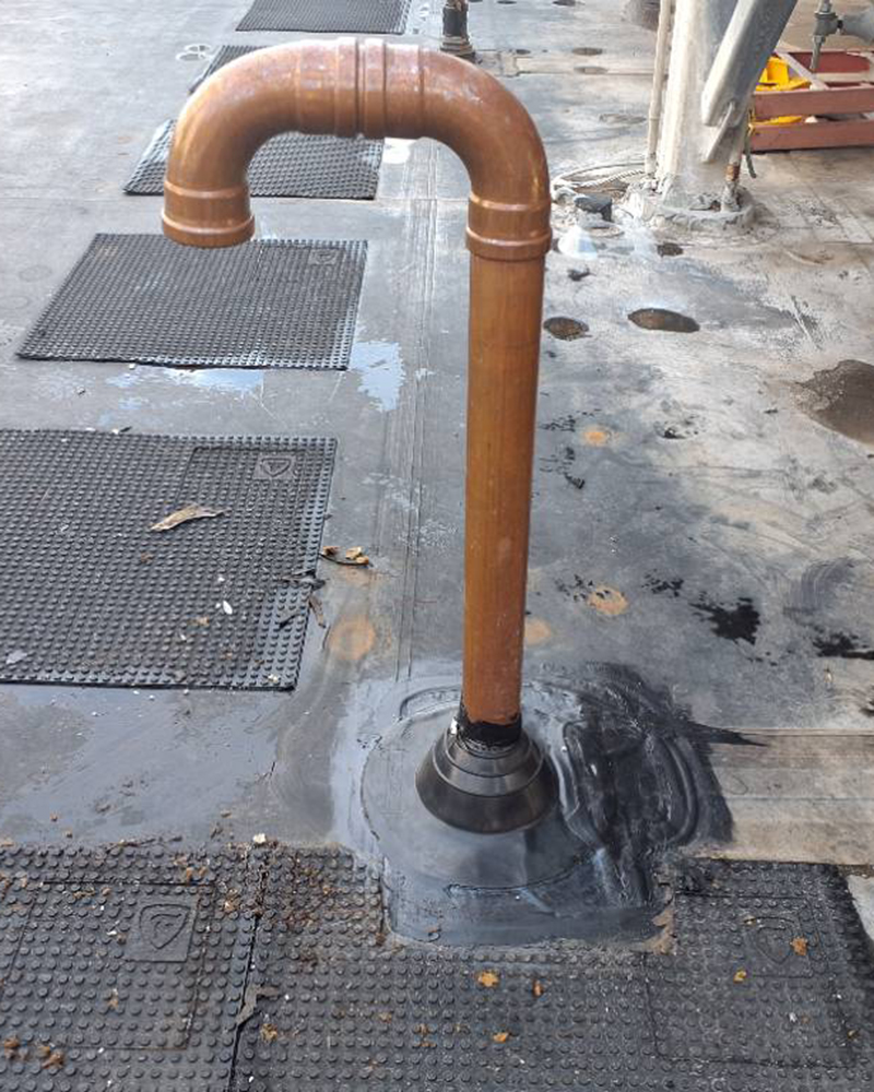TectaAmericaNE's tweet photo. Our #Billerica service team arrived at a building in NH where a copper pipe had been inserted through an existing pitch pocket but hadn't been flashed in properly. They removed the old pitch pocket and installed a properly sealed pipe boot to prevent leaks at that penetration. https://t.co/agLLTM7CZc