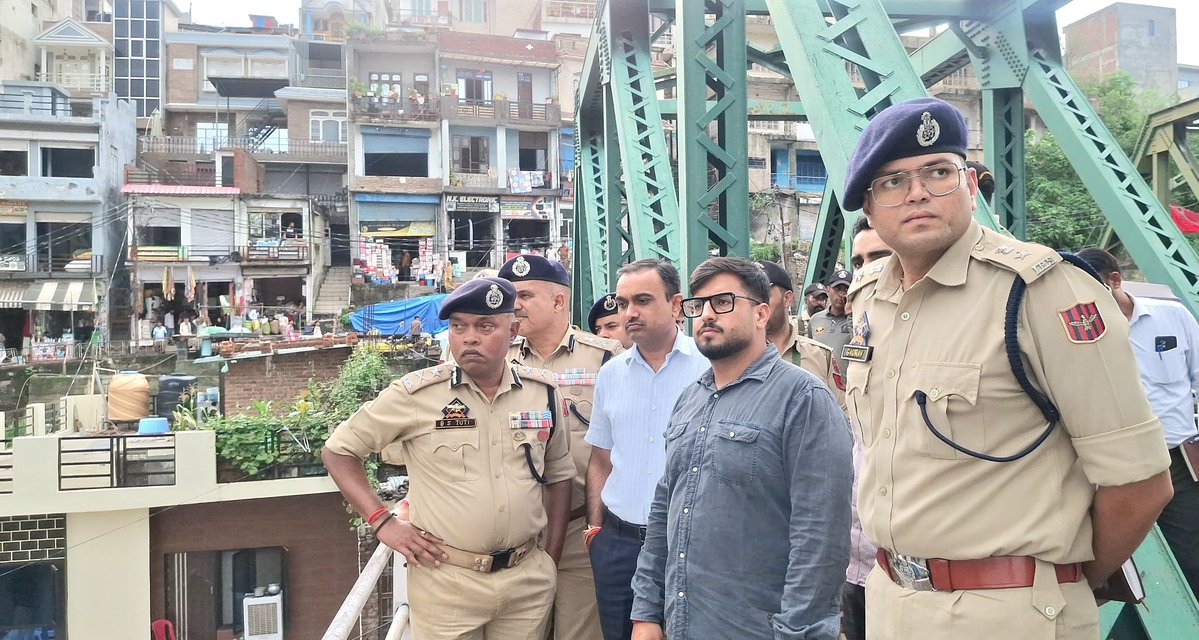 Divcomjammu's tweet photo. Divisional Commissioner Jammu @Rameshkumarias and @igp_jammu  Bhim Sen Tutti, today visited the flood-affected area of Bella in Rajouri district to assess the ground situation following the recent flash floods.

They interacted with the officers and field functionaries deployed on the spot and directed them to expedite restoration works, including clearance of damaged road stretches and restoration of essential services, so that normalcy is restored at the earliest.

Div Com and IGP Jammu also visited the Relief and Rehabilitation Centre established at Government Boys Higher Secondary School, Rajouri, to review the arrangements made for the affected families. 

Talking to the affected families, the Divisional Commissioner assured them that the Government stands firmly with them in this difficult time. He reiterated that every possible assistance and support would be extended to ensure their safety, comfort and well-being until the situation returns to normal, while directing all concerned departments to remain responsive and provide the best possible services.

The Div Com and the IGP Jammu also chaired a comprehensive review meeting and took a detailed overview of the response measures undertaken by different departments and emphasized the need for close coordination to ensure timely relief, restoration of essential services and effective disaster management.

The Deputy Commissioner and the Senior Superintendent of Police were directed to identify vulnerable and flood-prone hotspots from where residents can be shifted to safer locations during emergencies to prevent any loss.