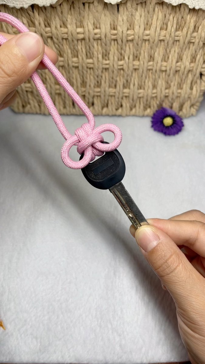 ShondraKauder's tweet photo. Just finished this tiny macramé keychain—used 3 colorful cords and a simple square knot. Perfect for sprucing up my new bag! https://t.co/qoSu5cYTYg