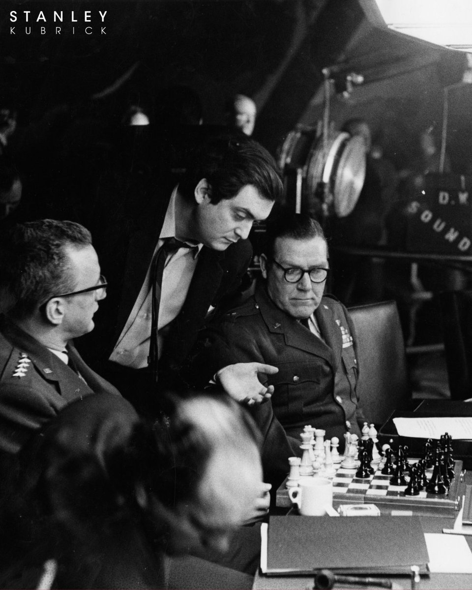 StanleyKubrick's tweet photo. Between set-ups on Dr. Strangelove, Kubrick and George C. Scott could often be found locked in a chess match, right on set.

Kubrick's passion for chess began as a teen, playing speed matches against hustlers in New York's Washington Square Park.

#WorldChessDay #DrStrangelove #StanleyKubrick #BehindTheScenes