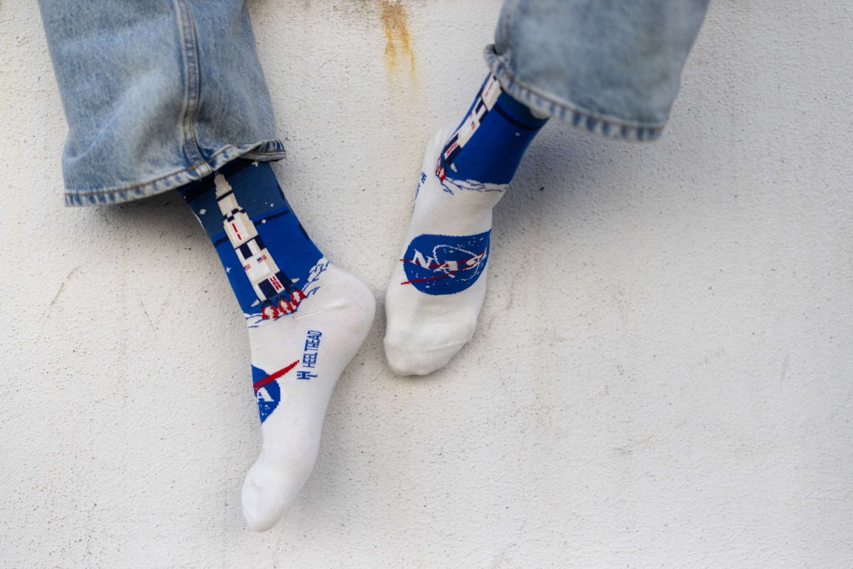 HeelTread's tweet photo. Socks, we have liftoff. Saturn V up one leg, meatball on the other. Small steps, giant leaps, warm feet. Link in bio. #NASA #Apollo #SpaceSocks #HeelTread https://t.co/H0eBodk5Vf