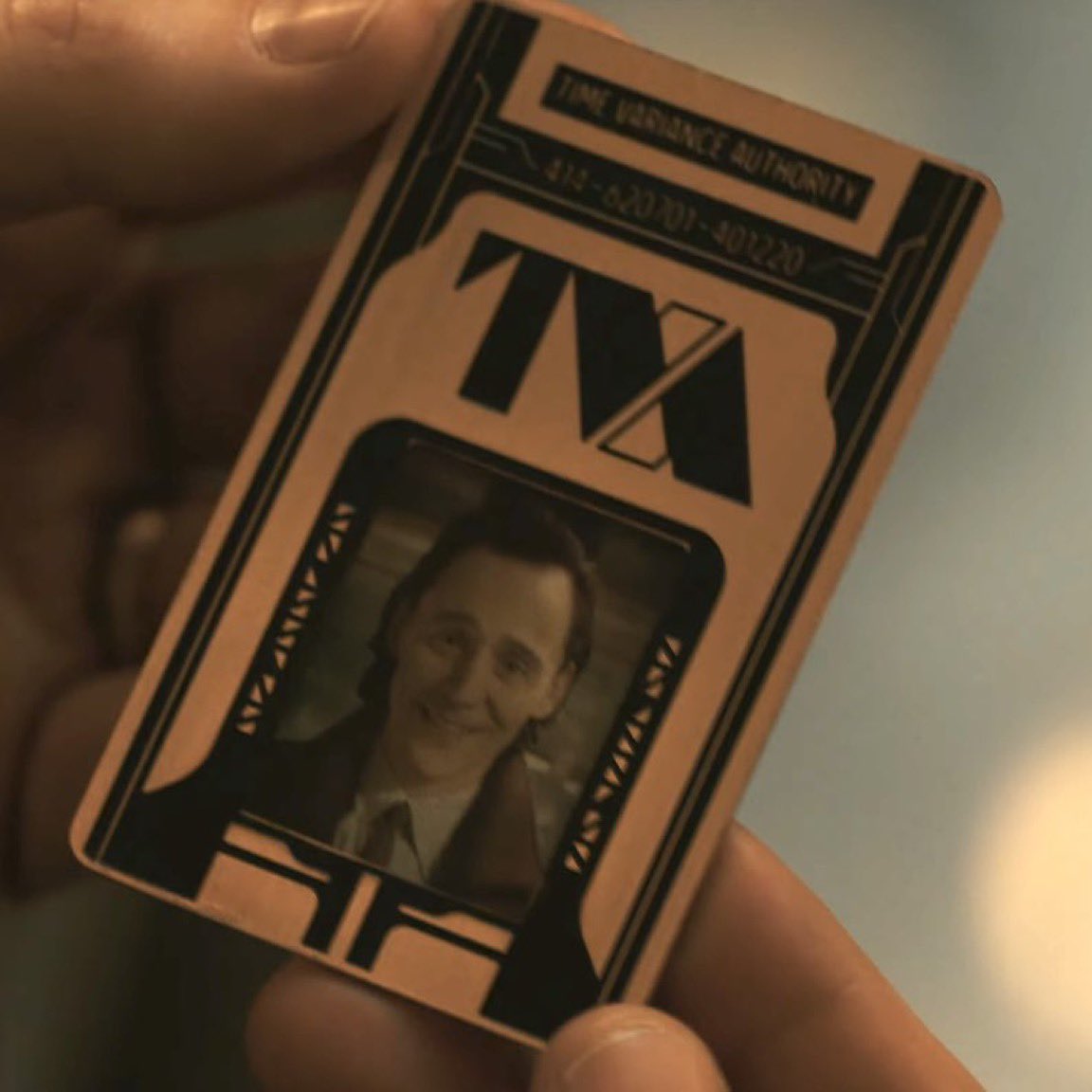 gardensinrain's tweet photo. btw whoever’s holding Loki’s TVA card in this frame (ESPECIALLY if it’s actually Steve Rogers) is gonna have such a hard time reconciling that this is THE man who took over New York back in 2012, who is now smiling like a cute ass cinnamon roll in an office uniform 😭😭😭🥀 https://t.co/ajAXfUSKwy