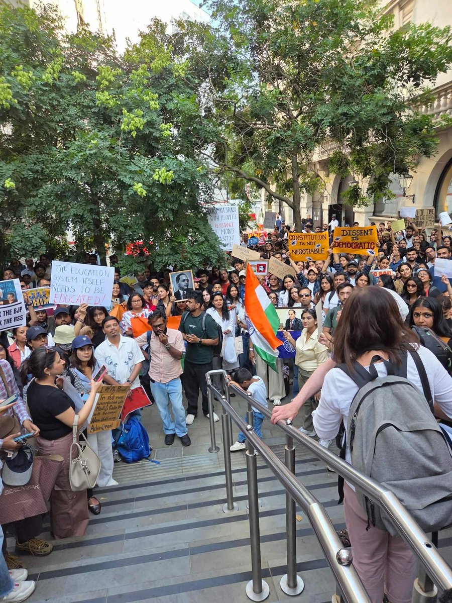 SAsiaSolidarity's tweet photo. Happening now! Hundreds of people have gathered outside the Indian High Commission, London in  solidarity with the massive youth protests  rocking India demanding the resignation of Modi and Education minister #DharmendraPradhan 
##संसद_मार्च https://t.co/hhUlBkouRS