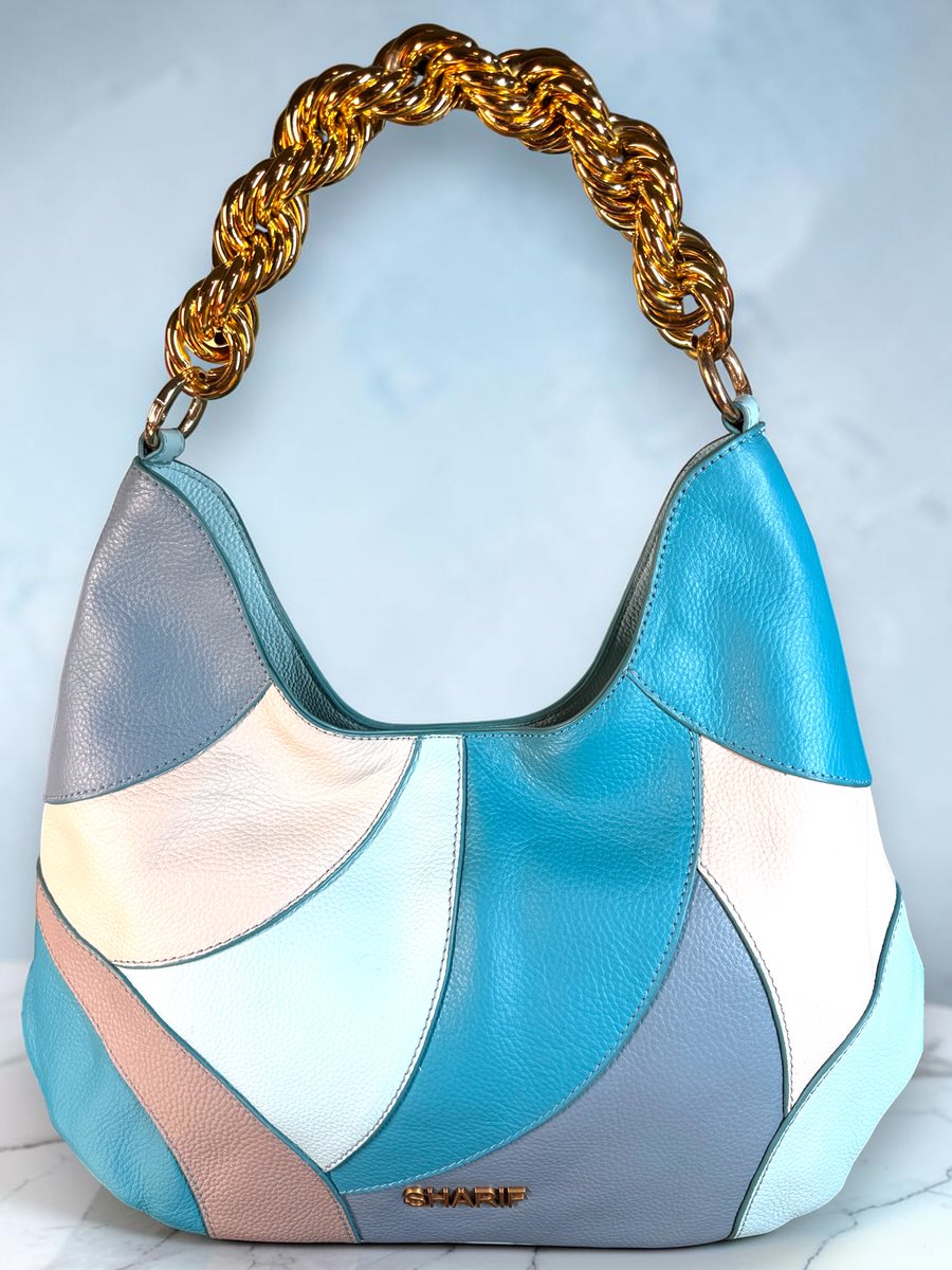 gypsycwgrl's tweet photo. Bold color, timeless craftsmanship, and rare vintage appeal! This authentic Sharif 1827 patchwork leather hobo is currently the only one available online. A true collector's find. #Sharif #VintageHandbag #RareFind #LeatherBag #GypsyCowgirlBoutique #TrustedSeller #FiveStarSeller https://t.co/spy756CrIq
