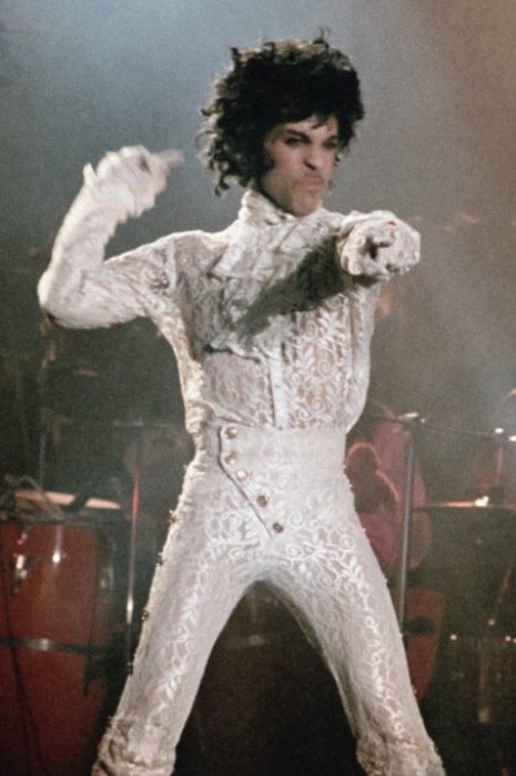 stillwater4u's tweet photo. One thing Beyoncé will do is TEASE her next era hard!! this prince inspired serve is gagging me. I need to see it without the COAT https://t.co/SWRcHOAqXB