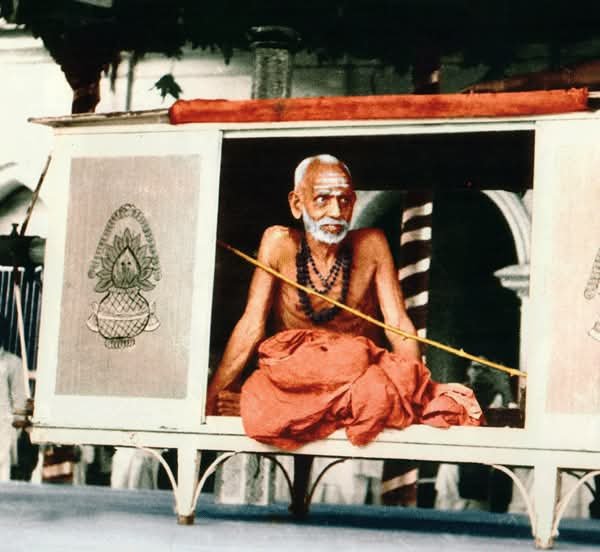 Balaganpathi's tweet photo. Experiences with Maha Periyava: The God that saved my life 

Once a High Court Judge from Chennai came on inspection to the Chengalpat District Court. He would always have a lot of work awaiting his attention. So, he would schedule his work meticulously and come over. During one such visit, he was to return early to Chennai. The Judge had planned to have only Sri Maha Periyava's darshan on completion of the inspection, before he returned to Chennai. Making the necessary arrangements, I went with the Judge in his car to SriMatham, Kanchipuram, and we had darshan of Maha Periyava. After conversing with the Judge, Maha Periyava ordered me to take the Judge around some big temples in Kanchipuram.

I was apprehensive to talk to the Judge. He wanted to get back immediately, but for me, I could not refuse to comply with Sri Periyava's orders. With great hesitation I told him about Sri Maha Periyava's orders. As he agreed to it half-heartedly, I took him to some of the temples. After a delay of around two hours, the Judge started back for Chennai.

There was a strong wind blowing with heavy rain at that time. When we reached the highway, we saw workers removing a large tree that had fallen on the road. When we inquired, they said that the tree had fallen down about one and a half hours back, but they could manage to assemble workers and start getting it off the road only by then. Only then we understood the sookshmam (subtle work) of Sri Maha Periyava's orders.

Perhaps if we had ignored Maha Periyava's words, that tree could have fallen right on our car. Even if it was not to be so, we could have got struck in that place for a long time without being able to continue our journey. The compassionate orders of Sri Maha Periyava saved our lives on that day and I can never forget it.

Narrated by  P.K. Ramanathan, Chennai-24
Source: Maha Periyaval Darisana Anubhavangal Vol. 2
Compiled by Jagadguru Sri Maha Periyava - Kanchi Paramacharya/Fb
