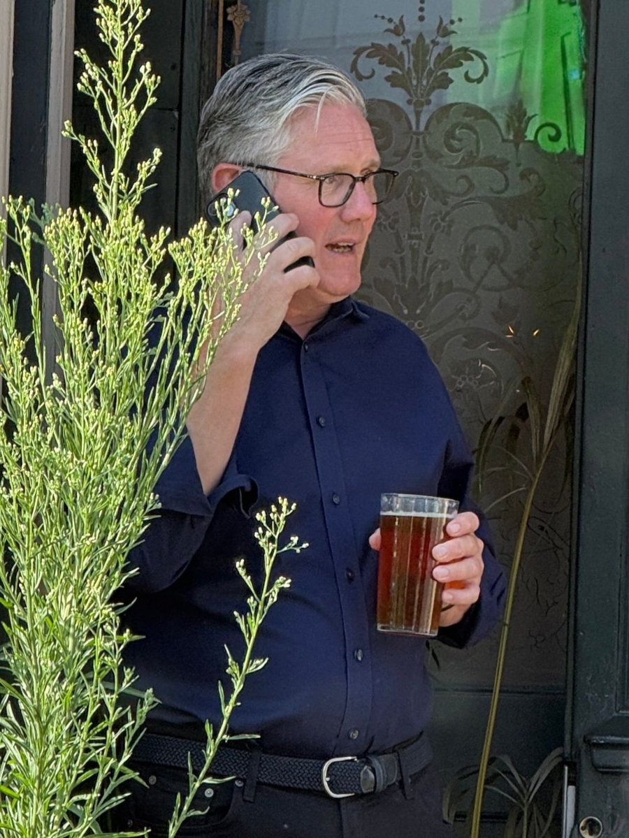 DonnaLouise1212's tweet photo. 📸 Caught red-handed...

Keir Starmer sneaking about behind a tall plant at the pub, taking a private phone call well out of earshot of everyone he's supposed to be with.

This slippery bastard is still creeping about like a snake in the grass. 🐍🍺 https://t.co/hY6NetaWnm