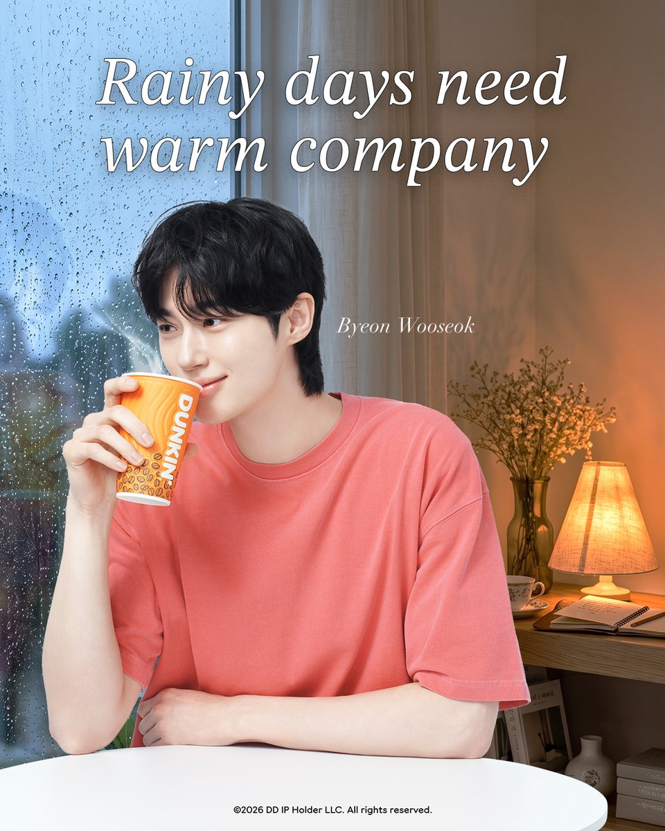 dunkinph's tweet photo. Cold weather calls for a hot cup of coffee. 🌧️☕ #ByeonWooseok_DunkinPH https://t.co/1Vl2kYpYWT