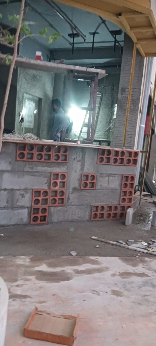 Aasif03's tweet photo. Unauthorized structural alteration in progress at Delux Mahal CHS, 16th rd, Bandra W, External wall broken for a commercial exhaust duct. Immediate inspection by @mybmc is urgently needed. @mybmcWardHW https://t.co/JnJZRY27e5