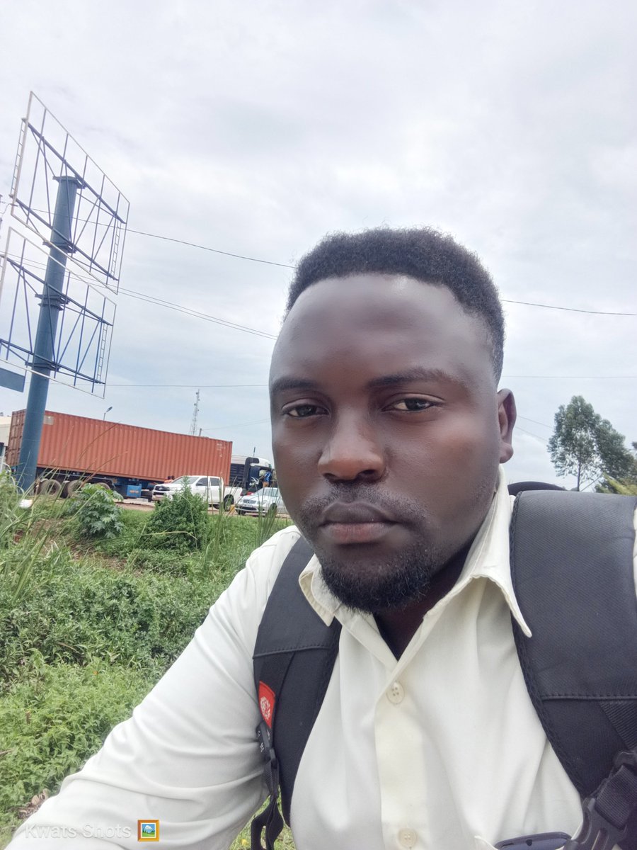 PraiseKwats's tweet photo. I took this pic at the Mbarara By pass roundabout at Coca-Cola as you're going to kampala. I was waiting for a taxi to take my application and documents to Mitooma District because they had advertised. 

I was in my second week of unemployment after being fired prematurely by the company that employed me for only 2½ months. 

Dear fresh graduate, they are going to use you, especially when you've not yet gotten your full documents and processed your registration with the regulatory body. 

Life became hard in Mbarara, the firing was the least thing I had expected. Good enough I had already obtained my transcript. 
That's how I left Mbarara for good and came to Kampala.
