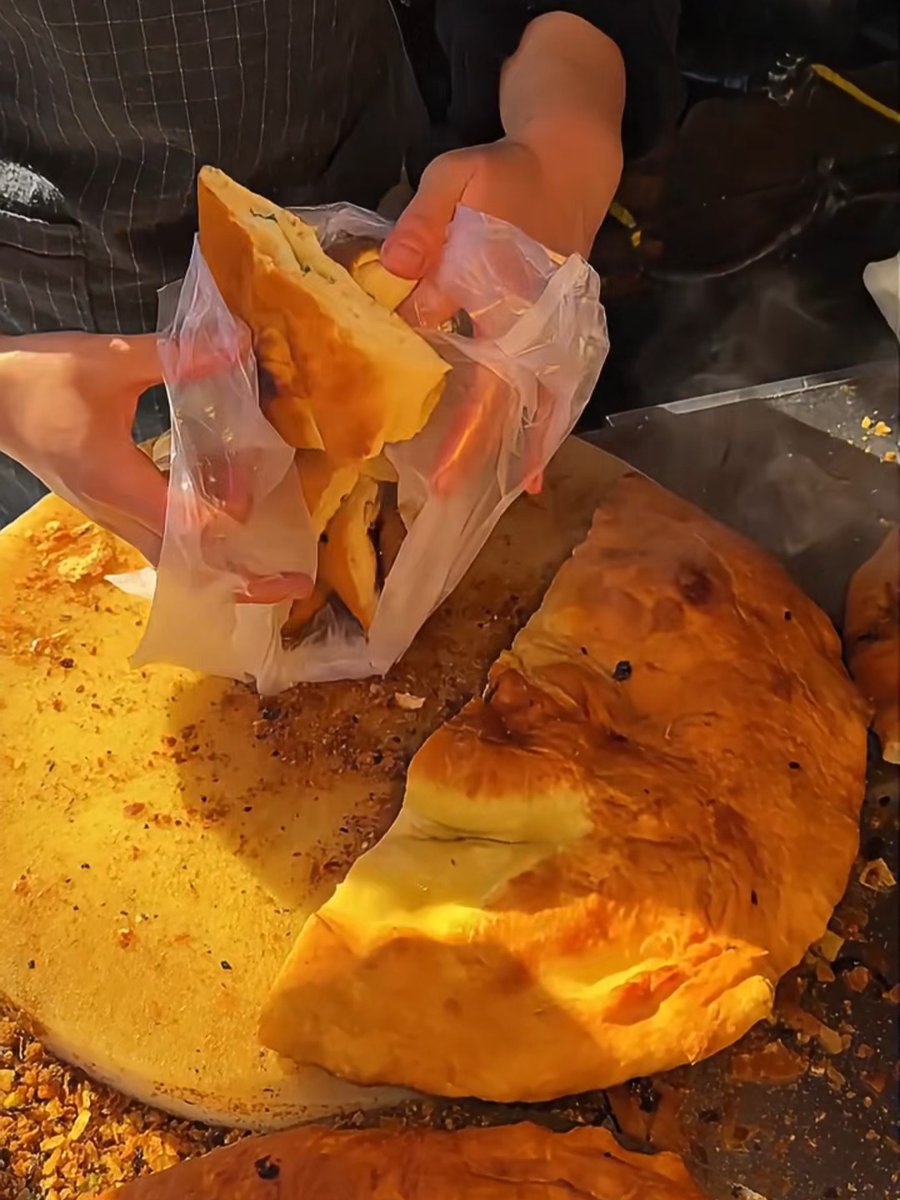 talgatone's tweet photo. Craving late-night street food  Flaky crispy scallion pancake just off the griddle—hot, savory, and perfect for a quick pick-me-up! https://t.co/17pupC4R3h