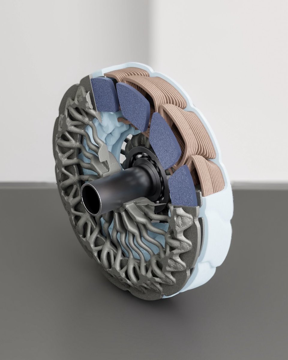 leap_71's tweet photo. Designed for a low-resolution experimental multi-material 3D-printing process, this Noyron-based electric motor design envisions what we can build once manufacturing technology evolves. Noyron’s engineering model takes the fabrication process and its constraints into account. https://t.co/S9475JU3Ue