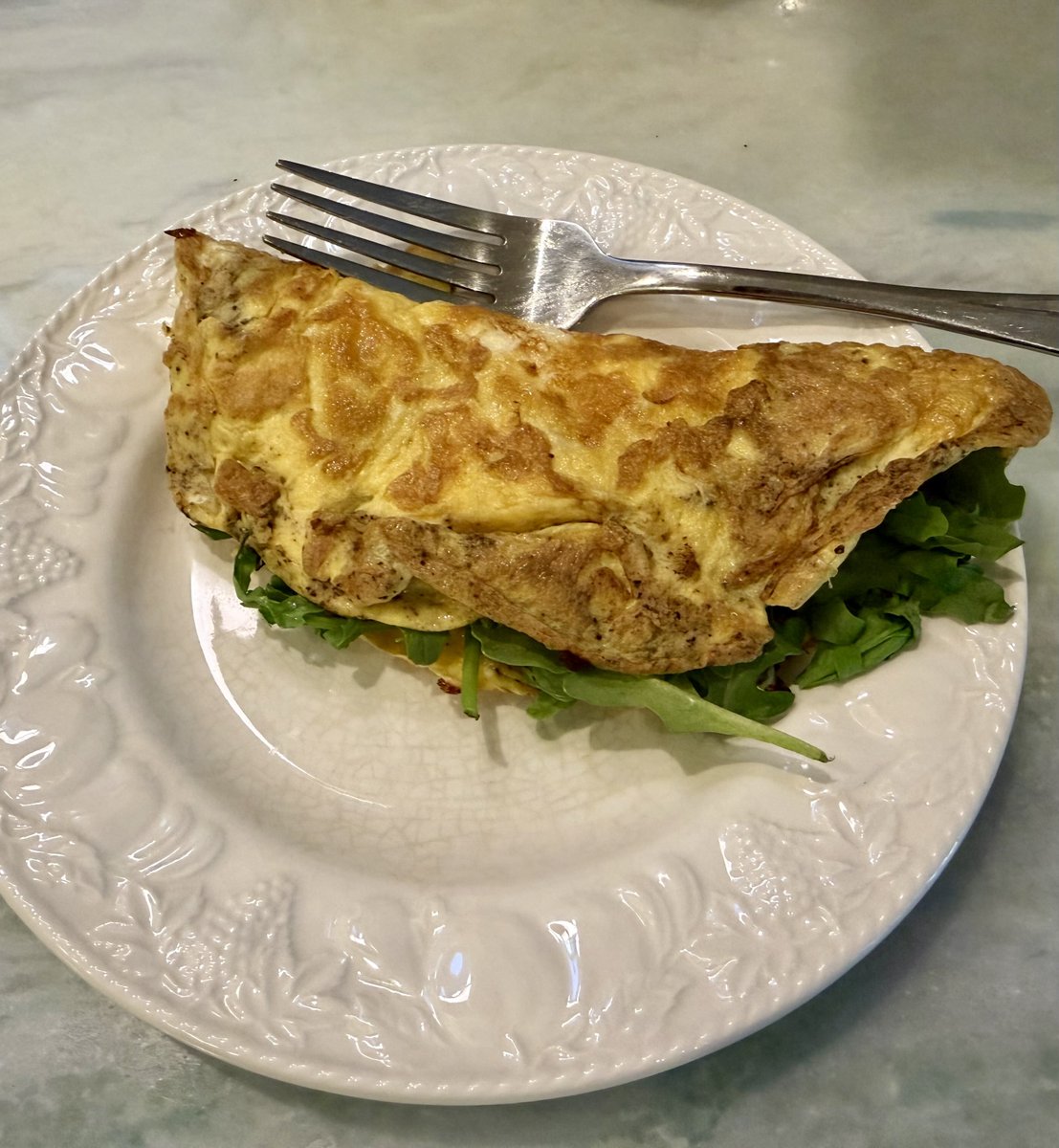 Allison12210ff's tweet photo. Trying to increase my protein intake naturally. Made an omelette this morning for the first time since I moved to New york . Two whole eggs with feta, thyme, arugula and prosciutto. https://t.co/udaN7iHwnq