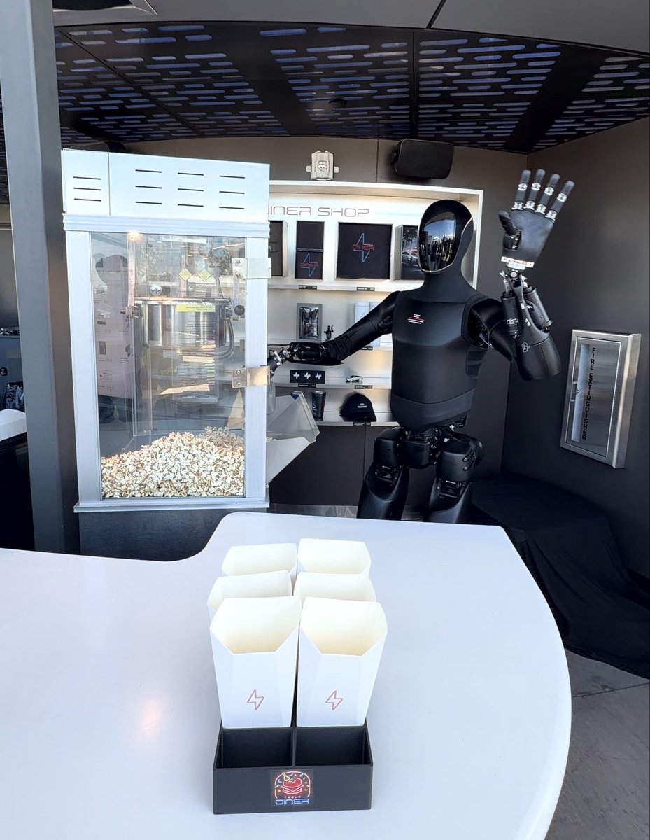BLKMDL3's tweet photo. Thanks for the popcorn @Tesla_Optimus. 

He is here at the Tesla Diner all day until sunset. https://t.co/5NjGX76BnV