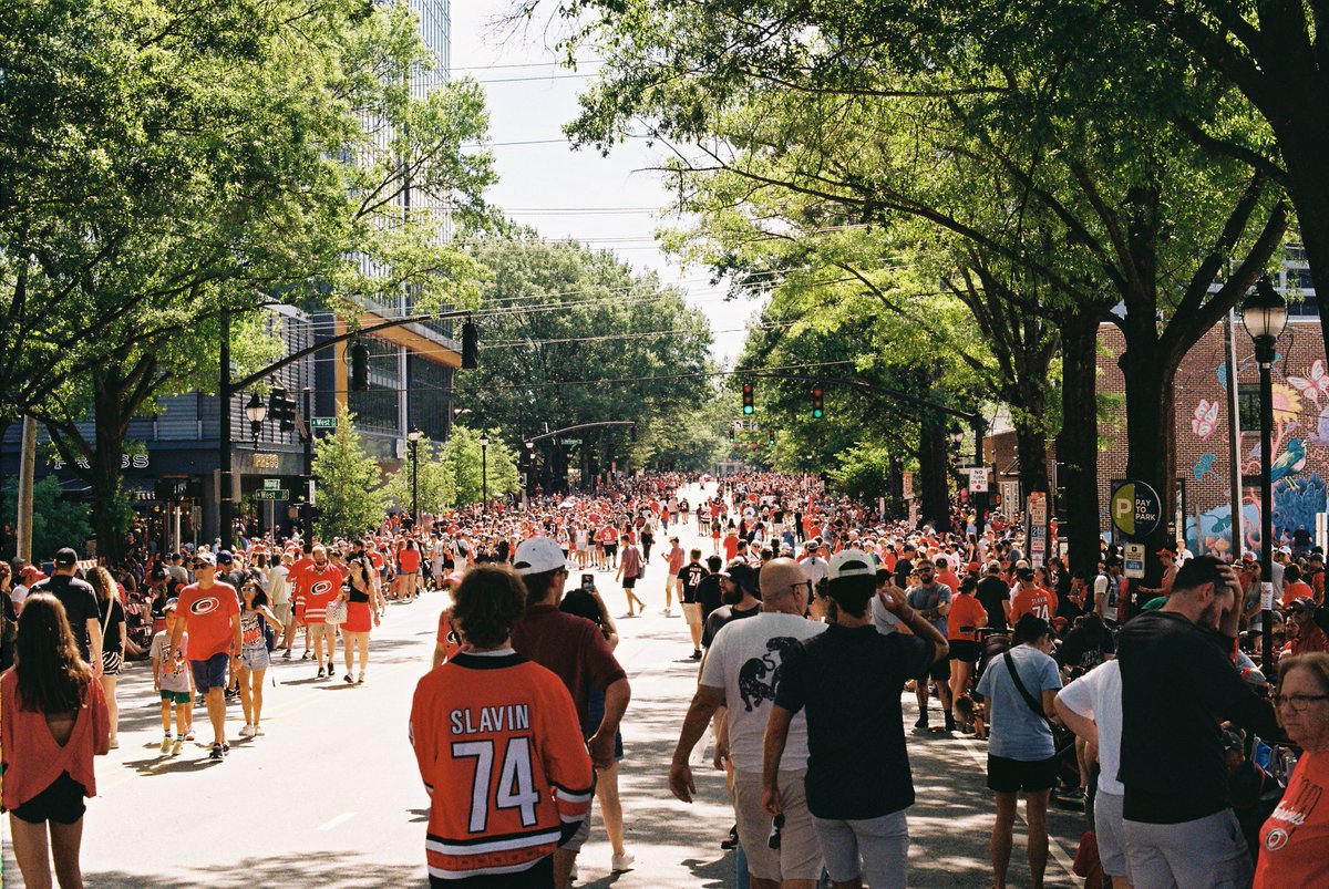 ScottAnthony98's tweet photo. @bluerosetori Helllll yeah! I got an AE-1 Program (w/ the stock lens iirc) a few years ago and have been loving it! 

Took it with me to the Hurricanes' championship parade last month and got some great results https://t.co/1QZy08TDpT