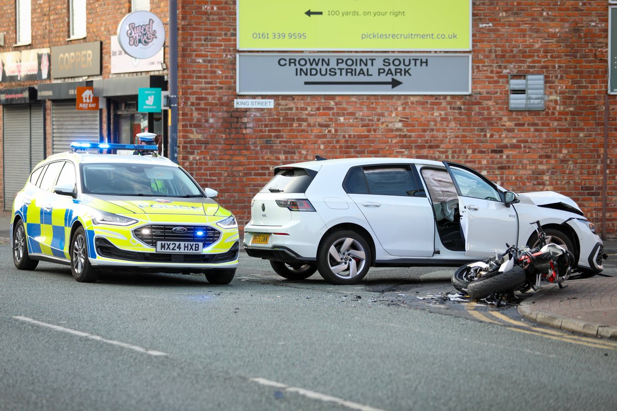aspmcr's tweet photo. Stockport Road in Denton was closed in both directions this evening after a collision between a Volkswagen Golf and a motorcyclist.

Severe damage that is consistent with a head on crash was seen to the front end of the Golf.

It's unclear how seriously injured those involved are https://t.co/66PdL9M509