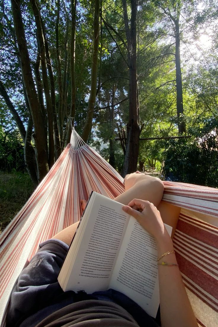 BookTasters's tweet photo. Sun-tired in a hammock, reading about winter storms and imagining the breeze, blissfully ignoring reality. https://t.co/zb7TpaUDix