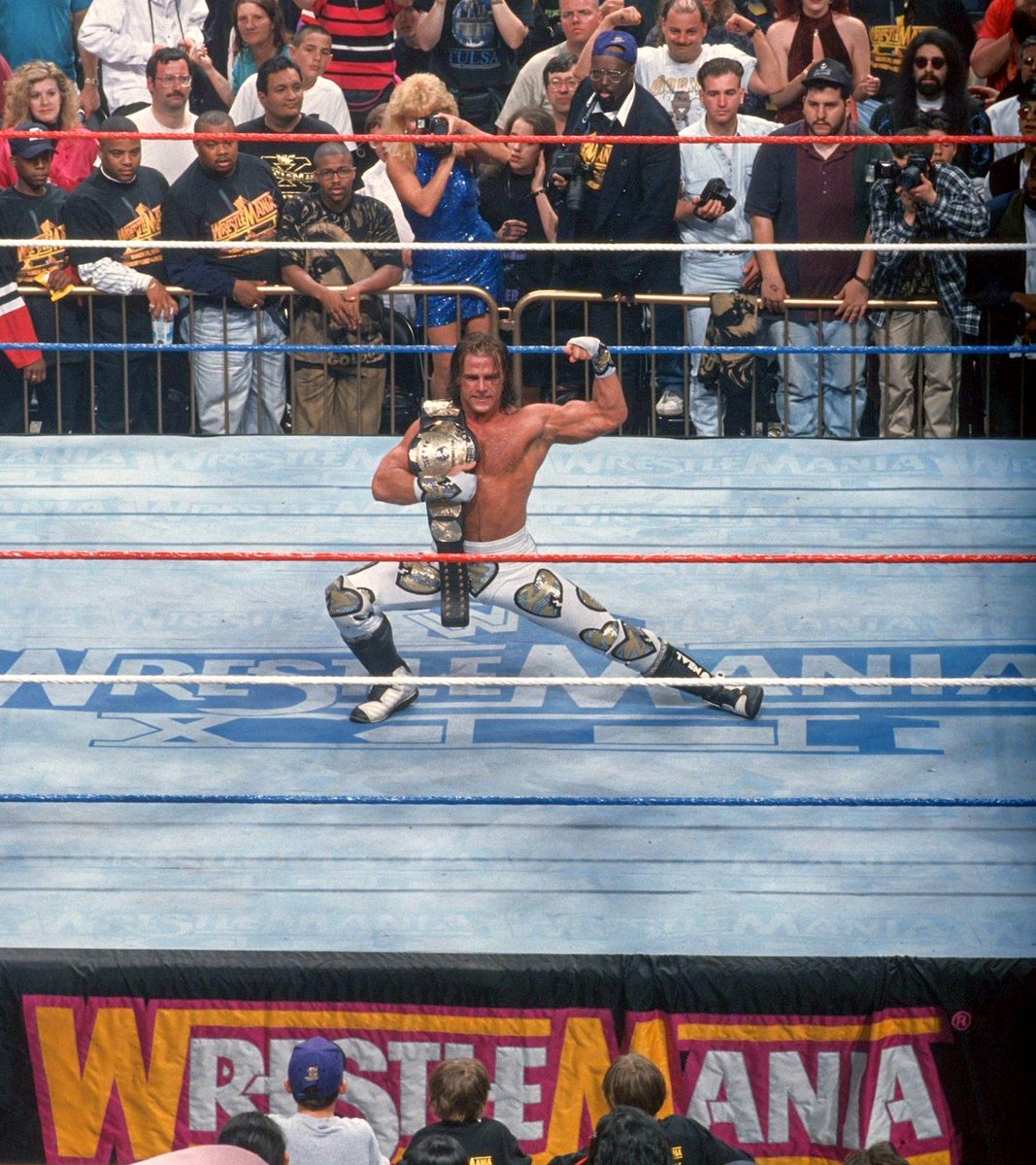 WWFWrestling1's tweet photo. WrestleMania Wednesday! Shawn Michaels embarks on his first run as WWF World Champion. WrestleMania XII, March 31, 1996. 💔 #WWF #WWE #WrestleMania #BretHart #ShawnMichaels https://t.co/2dC8oiCiYW
