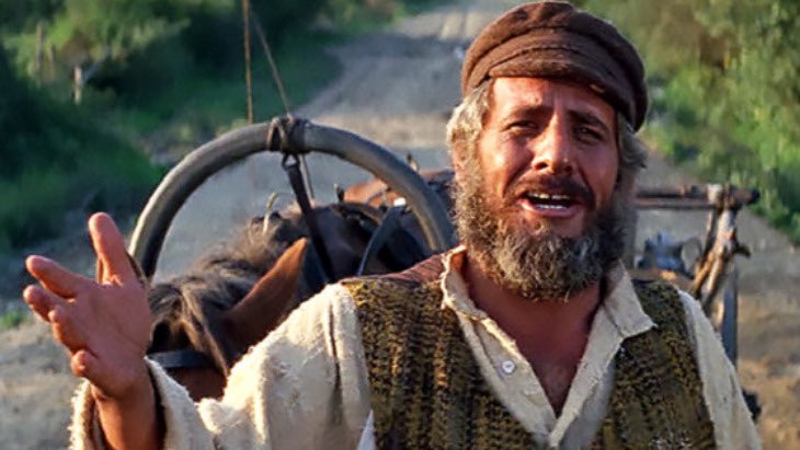 justcude's tweet photo. I’ve been saying this for years (mostly to my wife) but @AdamSandler you need to remake the great Fiddler on the Roof! I can’t unsee you doing this. Chaim Topol, I believe, would approve. #lchaim @netflix https://t.co/ZXTt6JULBp