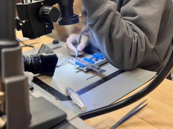 Close-up of a microsoldering workstation.