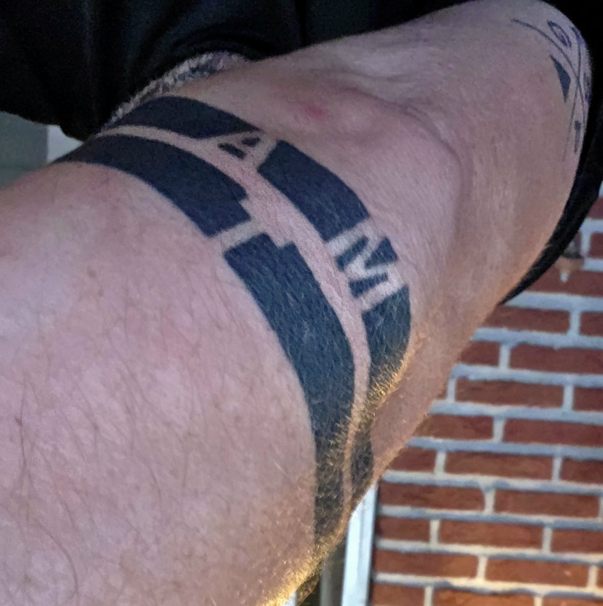 dohmen75's tweet photo. @harrytwips @grok It holds a unique meaning for everyone. Have two: Top one bears first letter of my parents' first names, and the bottom one that of my brother. To me, they signify rings of embrace and protection. If one of them passes away, a small star is added next to the corresponding letter. https://t.co/XsxkmykX3c