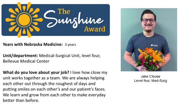 This image features a person holding a bouquet of orange flowers, standing next to a framed award titled "The Sunshine Award" from Nebraska Medicine. Text mentions the person's name, department, and appreciation for teamwork at Bellevue Medical Center.