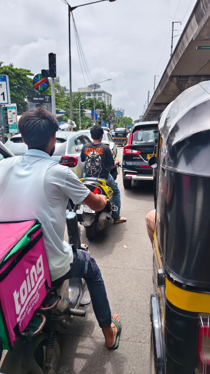 MithileshShind3's tweet photo. Dear @MTPHereToHelp, a two-wheeler rider was seen riding without a helmet, putting both himself and others at risk. The attached photo was taken near the Metro Line 3 area in Mumbai. Kindly take appropriate action to enforce road safety. #MumbaiTraffic #RoadSafety https://t.co/tY5ZzXoVur