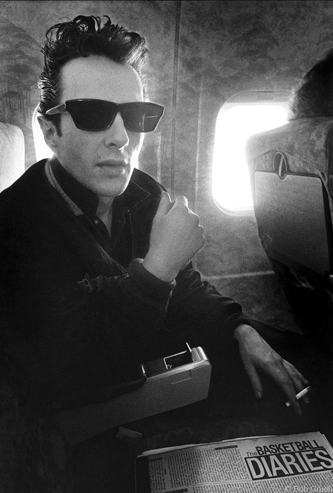 NewWaveAndPunk's tweet photo. Joe Strummer of #TheClash by Bob Gruen. 
Shades on a plane.😎 https://t.co/xyro9scFX6