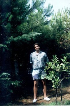 truthtold24's tweet photo. I WILL NOW RE-RELEASE AND AUTHENTICATE A PHOTOGRAPH OF A REAL LIFE 10 FT TALL EXTRATERRESTRIAL HUMANOID 
**For The additional 15k followers that didn't get to see this**

Location: Montesilvano Italy
Year: 1976
Person who took the photo: Professor Bruno Sammaciccia

The original negatives for this photograph are held in a Swiss bank security vault that is owned by same Swiss Citizen who owns this picture. 

Name of E.T.E./N.H.I.:
He introduced himself as "Dimpietro" When he spoke Italian. 
His nickname that humans close to him called him was "Mr Kenio".

- Here is the information I have on this Extraterrestrial Entity:
-His height is approximately 9 ft 11 in. 
-He is the commander of the largest #extraterrestrial base off the Adriatic Coast. 
-He is benevolent and represents a benevolent species and civilization. 
- His home planet is the 4th planet out in the Altair Star System, less than 18 light years away from Earth.
-He was part of the W56 program that originated in Italy in 1956. 
-He can harness photons naturally. 
- He likes to laugh, play jokes, and play the violin.

I will include both a black & white, and full color version of this photograph I am authenticating. 
My briefing on the W 56 program included this photograph, in which I have known it to be authentic, but just now found it to be leaked publicly years ago.
So I am now sharing it with you and giving you all the details I know on it. 
You wanted a clear photograph of a real #alien ? 
Here you go:

(**According to analysis done by Teresa Barbatelli of the photograph; 
Based on estimated measurements of the nearby pine needles at the time and some are railing in the background and other factors he was about 3.07 meters tall.**)