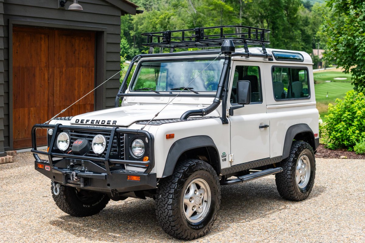 Bringatrailer's tweet photo. Now live at BaT Auctions: 1997 Land Rover Defender 90 NAS. https://t.co/GJf1ZfYyMY https://t.co/T2xKonRKVN