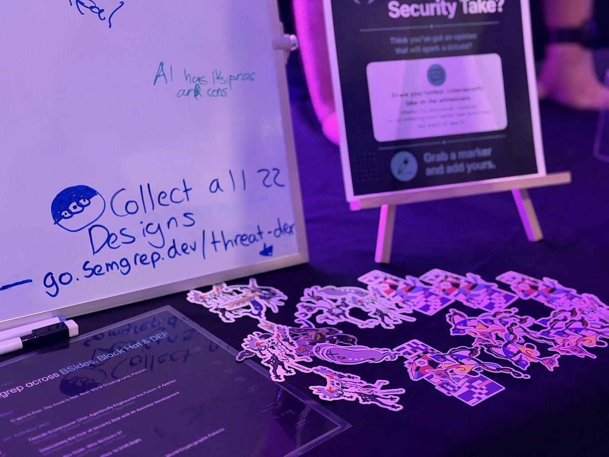InsiderPhD's tweet photo. Gotta catch ‘em all! Come find me or swing by the Semgrep Booth today to collect the first of the Semgrep Threat Dex stickers, 22 designs, each represents the last year in cyber security, from CISA and CVEs to Shai Hulud, new designs every day 🔥 https://t.co/usiOcvzKrj