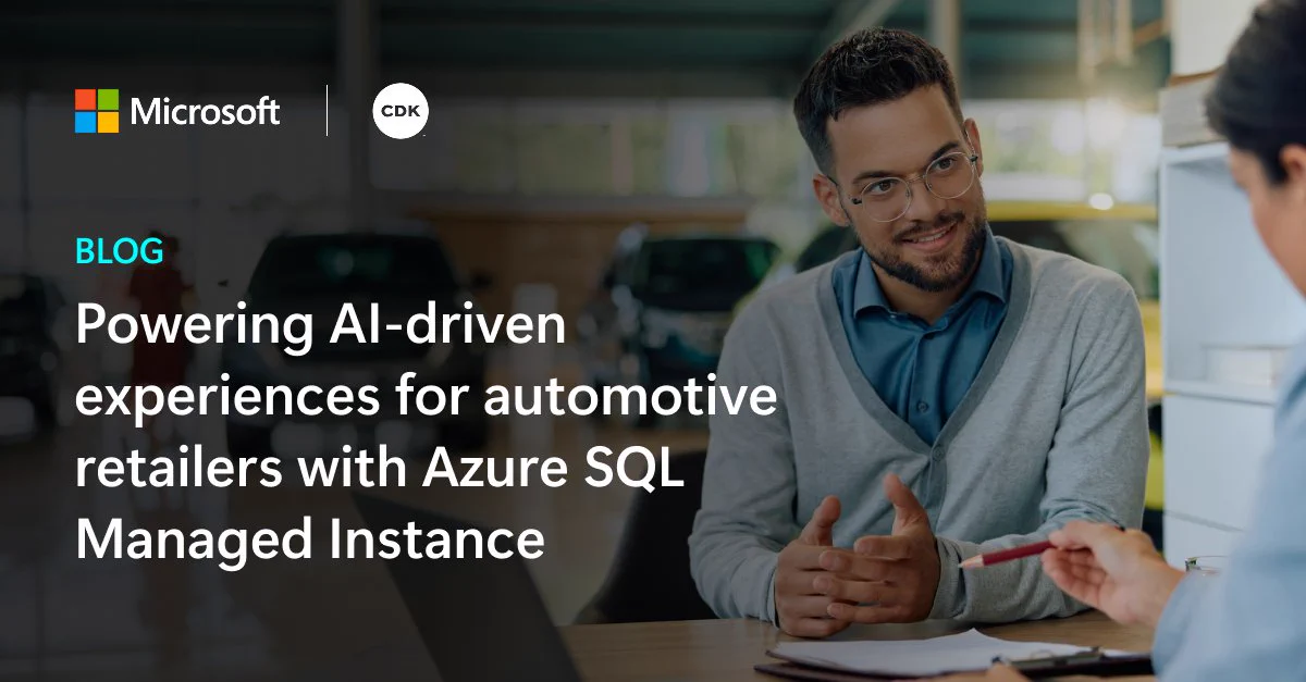 A man with glasses and a gray sweater smiles while discussing with a woman at a desk. Both are in a bright room filled with cars. Text reads 'Powering AI-driven experiences for automotive retailers with Azure SQL Managed Instance.'