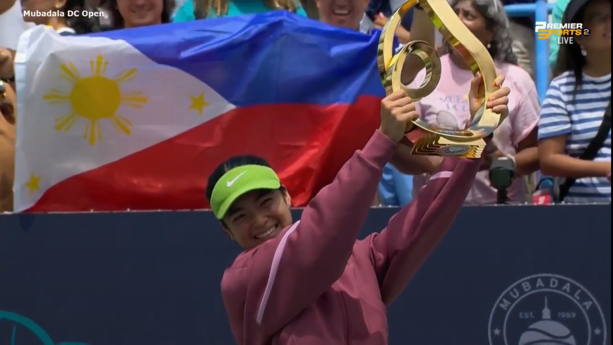 OneSportsPHL's tweet photo. QUEEN OF DC 🏆🇵🇭

Alex Eala proudly hoists the 2026 #MubadalaDCOpen trophy after outlasting World No. 3 Jessica Pegula in a grueling three-set, two-day championship battle, sealing a historic milestone in her career with a first WTA Tour-level title.

📸 Premier Sports 2 https://t.co/mldBSUjfva