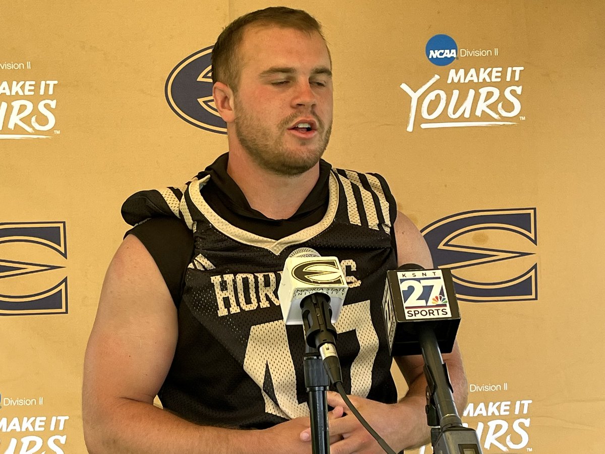 ESUSports's tweet photo. Interview tent focus today was on summer conditioning and the first day of practice. 
At the podium:
S&amp;C coach Tyler Kitzman
LB Brayden Bush
WR Trenden Collins
HC Garin Higgins
#StingersUp #UNIT https://t.co/8VPevbl0gY