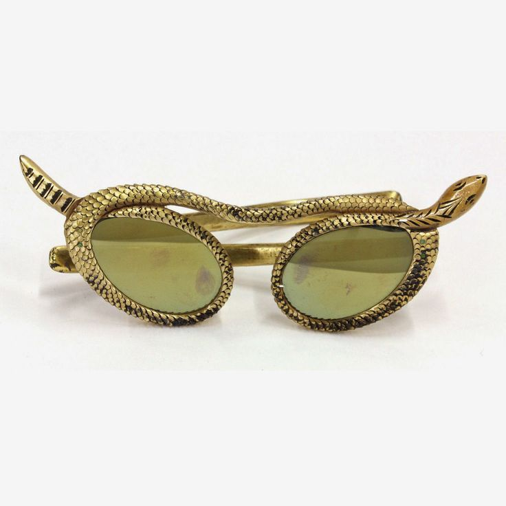 HerodotusWave's tweet photo. Hand-carved serpent sunglasses designed by Paulette Guinet during the early 1950s in France. https://t.co/EcQW7JLEmf