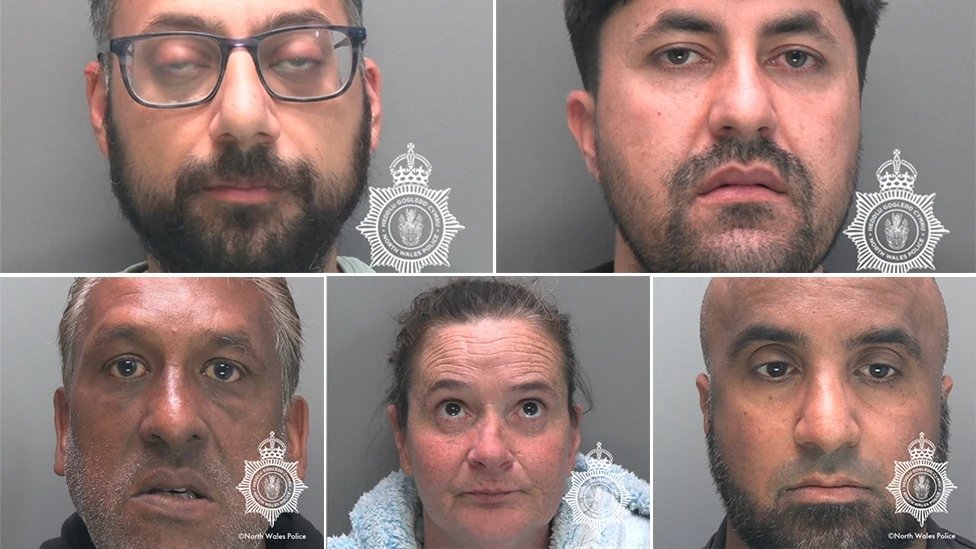 TRobinsonNewEra's tweet photo. Another day and another Muslim rape gang convicted of sex attacks on our people. 

Four men and a woman guilty of exploiting teenage girls for sex.

Mustafa Iqbal, Mohamed Arshad, Ziaullah Badshah, Jaswinder Singh were convicted of conspiracy to traffic their victims, who were aged 14,15 and 16.

At Caernarfon Crown Court today, Iqbal, Arshad and Badshah were also found guilty of rape while another member of the gang, Sarah Gray, was found guilty of perverting the course of justice and assisting an offender.

Hang them!