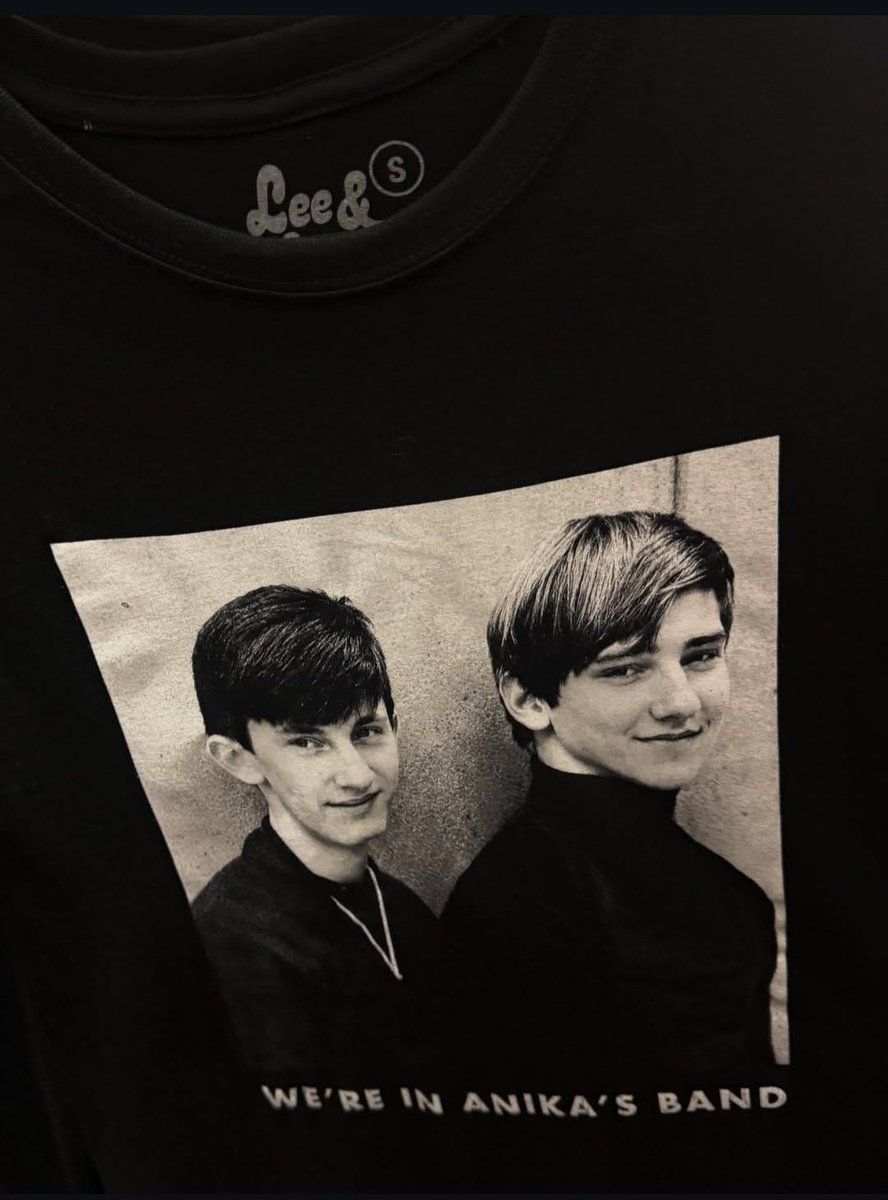 Racer24's tweet photo. RUSH 

I just saw this on an Instagram account from somebody who took pictures of shirts at the Rush pop-up store in New York city.

This is the greatest shirt... EVER!😁🤣

"We're in Anika's band" https://t.co/sBkpA4q3Tk