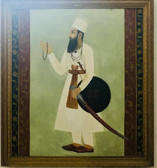 rubabbx's tweet photo. The British put a price on his head.

A local raja collected it.

Rs. 50,000. For the head of the man the British themselves called the most formidable rebel of the entire 1857 war.

Maulvi Ahmadullah Shah. Born circa 1787. Chinsura, Madras.
Son of Nawab Ghulam Muhammad Khan. Decani Muslim nobility.
Scholar. Sufi. Swordsman. Strategist.

He was sentenced to death by the British in February 1857.
Arrested in Faizabad for sedition.
Held in jail awaiting execution.

On June 7, 1857, the 22nd Native Infantry revolted.
They broke open the jail.
They freed him.
They immediately proclaimed him their commander.

He had been sentenced to die for preaching freedom.
He walked out of prison and went straight to war.

Months before Meerut he had already been moving.
Agra. Aligarh. Kanpur. Lucknow. Faizabad.
Organizing secret resistance cells across Awadh.
Preaching armed resistance under the cover of religious sermons.
Building the network that would become the backbone of the uprising in Awadh.

June 30, 1857. The Battle of Chinhat.

Sir Henry Lawrence personally led 700 British troops out of Lucknow expecting a skirmish.
Ahmadullah Shah was waiting for him.

He had concealed 6,000 to 8,000 infantry, cavalry and artillery inside mango groves and mud-walled villages.
Lawrence saw nothing until it was too late.

Phase one. Artillery duel. Rebel guns positioned by former EIC gunners hit British crews with precision.
Phase two. Double envelopment. Rebel forces swept around both British flanks through the mango groves while the center held Lawrence's column pinned on the road.
Phase three. Encirclement. Lawrence found his entire force surrounded.

The Oudh Irregular Artillery defected mid-battle. Capsized their guns. Joined the rebels.
The British elephant howitzer was captured.
300 British soldiers killed. Over one third of the entire force.

Lawrence retreated to the Lucknow Residency.
The 87-day Siege of Lucknow had begun.

British General G.B. Malleson wrote after the war:

Of all the insurgent leaders he was the most formidable. He was a man of great abilities, of undaunted courage, of stern determination, and by far the best soldier among the rebels.

That tribute came from the enemy.

Ahmadullah Shah kept fighting.
Defence of Lucknow. Battle of Shahjahanpur. Guerrilla warfare through Rohilkhand alongside General Bakht Khan and Begum Hazrat Mahal.

On June 5, 1858, he rode on elephant to the fortress of Raja Jagannath Singh of Powayan.
He was seeking an alliance. A unified front.

The Raja closed the gates.
Opened fire.

Ahmadullah Shah was shot dead at the fortress wall.
His head was severed.
Presented to the British District Magistrate at Shahjahanpur.

Rs. 50,000 collected.

The man who broke a British army at Chinhat was betrayed by a man who chose a reward over his country.

His name is not in the textbooks they gave us.
His battle is not in the curriculum they designed.

This August, Pakistan turns 79.

We breathe free today partly because of a Sufi scholar from Madras who walked out of a British jail in 1857 and went straight to war.

Maulvi Ahmadullah Shah. Danka Shah. Lighthouse of Rebellion.

Inqalab Zindabad. 🇵🇰
