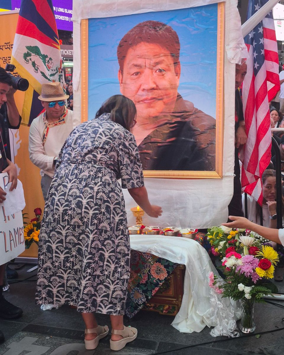 nyctaxi's tweet photo. Over the weekend Commissioner Valdivia lit an honorary candle at the Peaceful Candlelight Vigil for Lobga Rangzen in Times Square. He was a member of the TLC driver community, and we honor his life and legacy. https://t.co/40UtwlQWLi