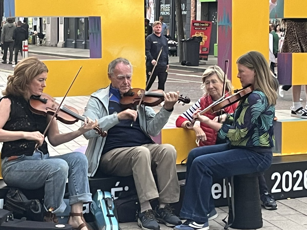 vincekearney's tweet photo. Belfast. On a Monday night 👏 Large crowds of folks like us wandering between #Fleadh venues @rtenews https://t.co/XWLcDVSmIS