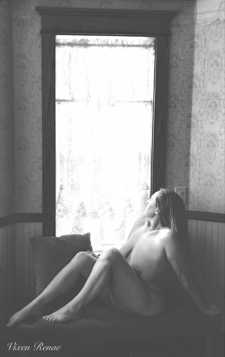 VixenRenae's tweet photo. She sits alone at the tall sash window of this ancient house, the delicate lace curtains diffusing the soft light that falls across her quiet form. Beyond the glass the street lies still, yet her gaze remains fixed upon it, for she awaits him. 🥀 https://t.co/oSobRM6nJz