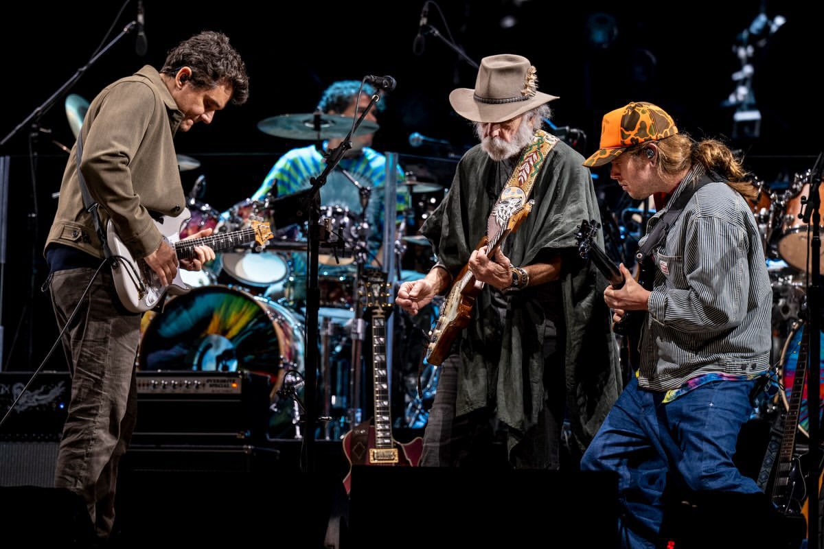 JohnMayer's tweet photo. Today marks a year since Dead and Company played our last of three shows in Golden Gate Park helping to celebrate 60 years of @GratefulDead . It would also become Bob Weir’s last appearance onstage. I wanted to take a moment to share with you just how incredible those concerts really were. Bobby’s insistence on standing on that stage in the midst of a complex health battle to perform nine hours of music over three nights was one of the greatest acts of heroism I will ever see in my lifetime. I watched him sidestep every traditional burden of entertainers - ego, superficial pride, vanity, to name a few - and sing his songs with pure heart and grit. He transcended his physical limitations by ignoring them. Bobby Weir, ever the contrarian, laid down his ultimate act of defiance; he was going to play these shows on his terms. He could have explained his situation in one online post, and the crowd would have lifted him like a giant wave up to glory. Fuck that. That wasn’t Bobby. Deal the cards. By the end of Sunday night, we’d created as many musical sparks as we ever had over a three night run. What he had to overcome in order to pull that off won’t ever be fully known to anyone. Some of the songs Bobby would play for the last time were shared with artists he loved and respected, @BillyStrings , #sturgillsimpson, #grahamelesh, @treyanastasio , and they’ve come to serve as a spiritual transfer. A blur between past, present and future. Like it’s always been. To use his own term, those three nights were the star in Bob Weir’s heavenly crown. The man you loved, whose music has given a more expansive inner life to us all, never backed down. In his final shows, after 60 years, he lived up to every measure of a person he’d ever stood for. It’s a master class of a life lesson, and I’ll take it with me forever.