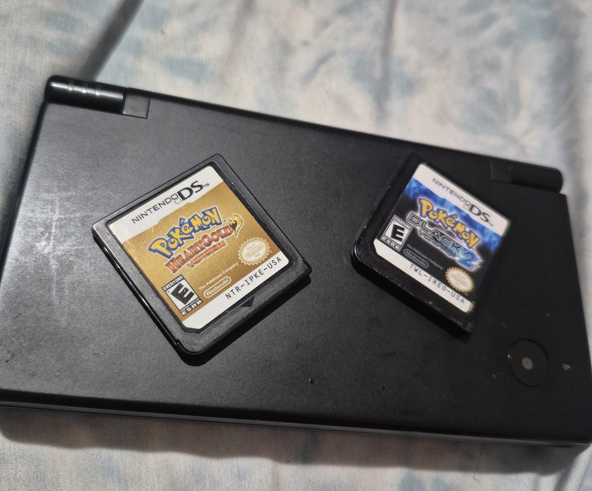 MultiGlitchn's tweet photo. I have struck (heart) gold. 
Also went to a local vintage game store yesterday and found Pokemon Black 2 😭😭😭
12 year old multi always wanted this game but never had the funds back then. Life is so peak rn 🤧 https://t.co/cdTRk91gW7