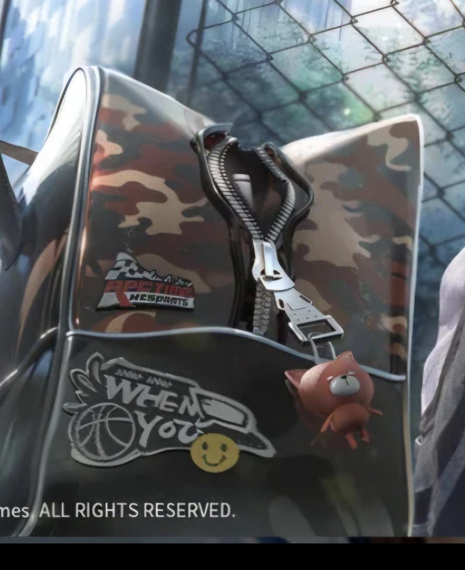 app1esavce's tweet photo. remember when caleb’s sports bag actually had words on it?? the brand of bag hes got + a sorta callback to his necklace!! AND a keychain that looks oddly familiar https://t.co/AFG3j5eXQf