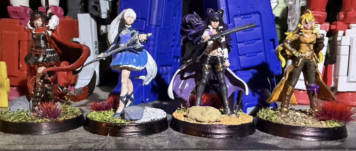 RUBYB00P's tweet photo. It’s been a while since I’ve painted anything so here’s my full set of team #RWBY miniatures! I hope you all like them! 
❤️🤍🖤💛

(Quarter for size reference)

#RubyRose #WeissSchnee #BlakeBelladonna #YangXiaoLong https://t.co/DJj5qNy31k
