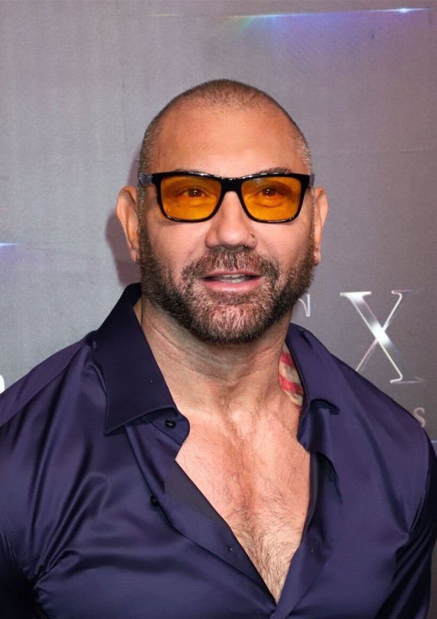 edcruzX's tweet photo. Dave Bautista is in talks to play Kratos in Amazon’s live-action God of War series, replacing Ryan Hurst after an on-set injury.

According to reports from Deadline and Variety published today, the former WWE star and Guardians of the Galaxy actor is negotiating to take over the lead role in the high-profile Prime Video adaptation of the PlayStation franchise. Hurst, who was cast as Kratos earlier this year and had already begun filming, tore a bicep while performing a stunt in late June, four months into production in Vancouver. The injury required surgery and a lengthy recovery that would have pushed the schedule significantly, prompting the decision to recast.

Production on the two-season order, showrun by Ronald D. Moore, paused after the incident. Prep for the new lead is expected to begin mid-August with filming set to resume in mid-October. Bautista’s extensive wrestling background and recent physical work on projects like the upcoming Highlander remake position him to step into the demanding role with limited additional prep time. 

The series adapts the Norse-era story from the recent games, following Kratos and his son Atreus (still played by Callum Vinson) as they journey to spread Faye’s ashes while navigating the world of the Norse gods. The supporting cast includes Mandy Patinkin as Odin, Ed Skrein as Baldur, and Ólafur Darri Ólafsson as Thor.
