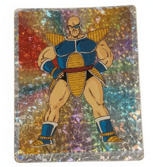 90Nostalgico's tweet photo. Una de las figuritas más difíciles de conseguir de Dragon Ball, el holagrama de Nappa

PD: No solo la 157 de Majin Buu era difícil 😅 https://t.co/IsjFFIoxAF